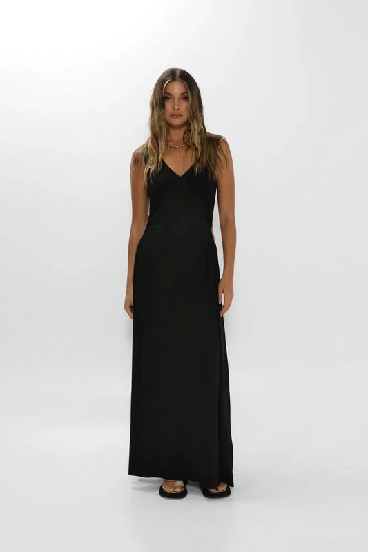 Model wearing black maxi dress.